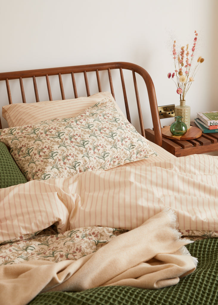 Introduce pure luxury with the Foxford Romantic Blossom Pair of Standard Pillowcases, part of our 180-thread count Everyday Collection. New for summer 2024, they feature a stunning blossom pattern in peach, pink, and green hues. Meticulously made in Portugal with 100% long-staple cotton and designed by acclaimed Irish designer Helen McAlinden, it guarantees the opulent cosiness and excellence of Irish bedding.